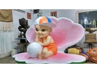 吉贝新地标“珍珠小童”被批像恰吉　艺术家：是贝壳精