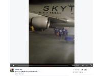 停飞时他们比旅客更着急　向台风中的航空小螺丝钉致意