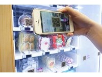 用手机决定幸福？台北烘焙展超人气“幸福点心贩售机”