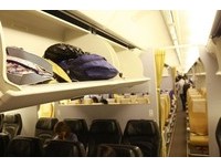 旅客有福了！美国航空班机开始增加机内头顶行李空间